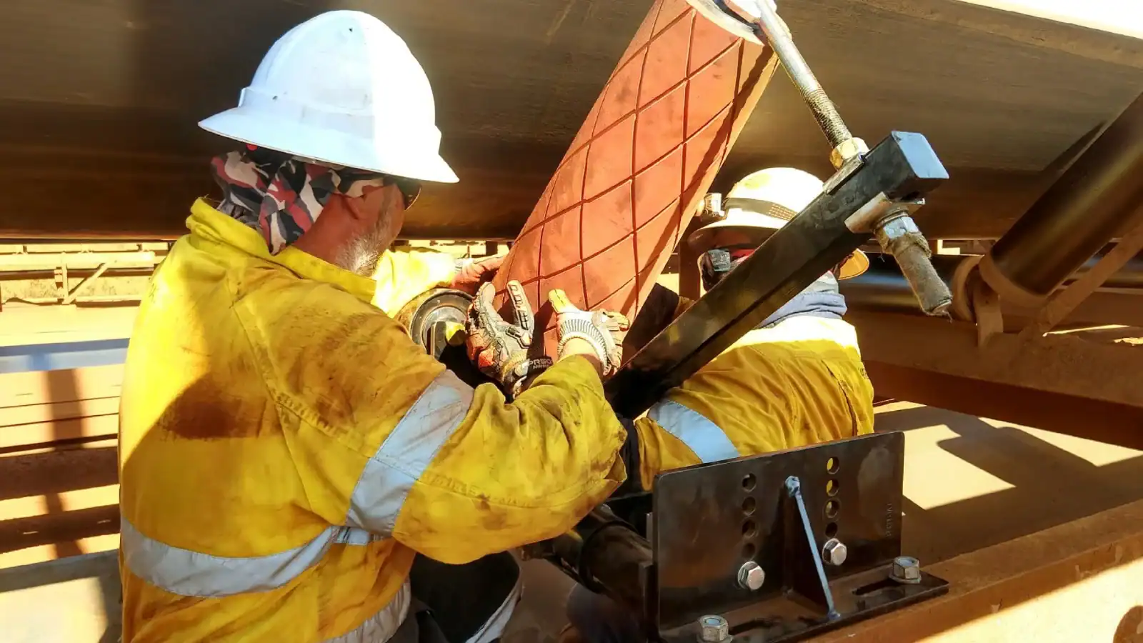 Rema Tip Top employee installing Rema Track