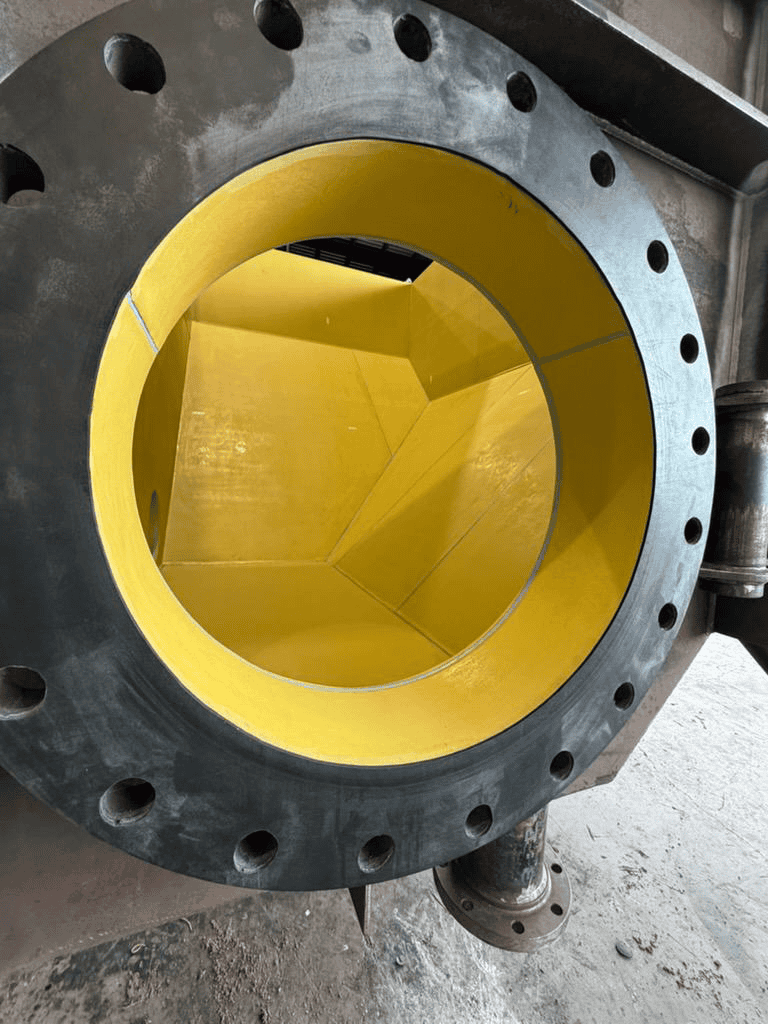Flanged mining spool lined with yellow REMALine 35 rubber lining